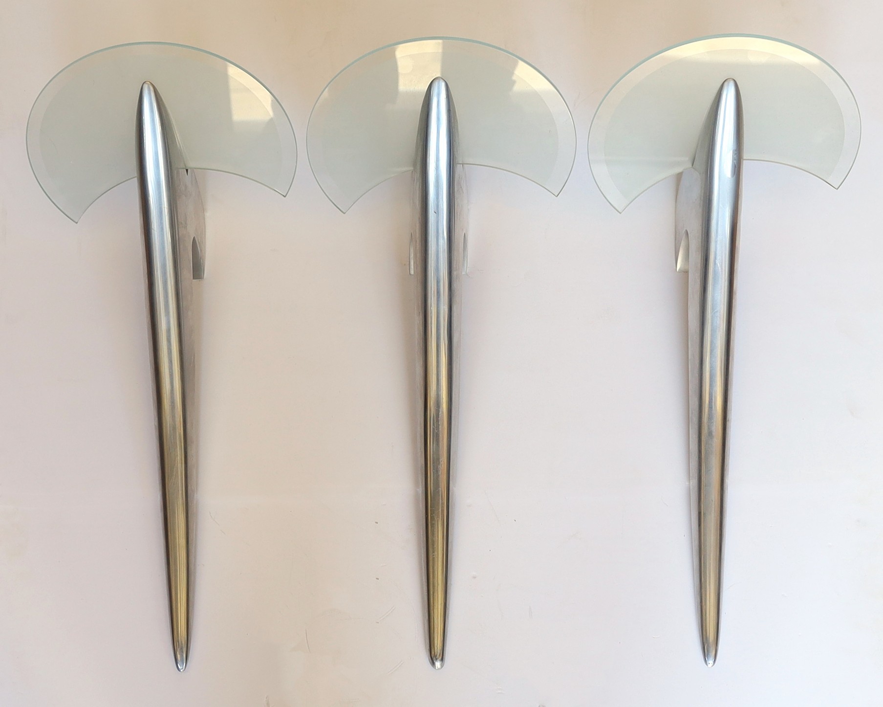 Three 1970s Danish aluminium and frosted glass wall lights height 53cm. width 24cm